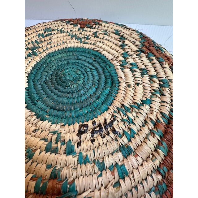 Southwestern design handmade basket inspired by tribal weaving technique from 1980s, adding a unique and vintage touch to...