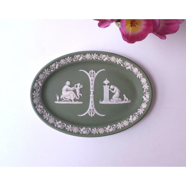An English Wedgwood Jasperware oval tray in sage green and white, Neoclassical design style, circa early to mid-20th...