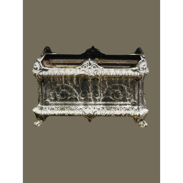 Elevate your garden or home décor with this antique French cast iron planter, a stunning example of 19th-century...