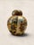 Painted by hand in the early 1900s, this small Satsuma ginger jar carries the kind of quiet artistry that stops you mid-...