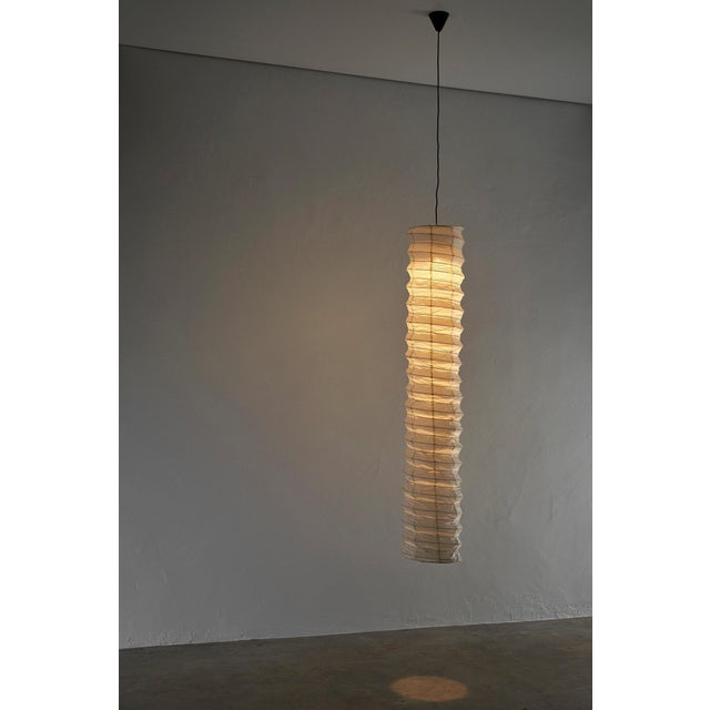 Introducing the iconic "akari" lamp model "l" designed by the legendary isamu noguchi. This particular lamp holds special...