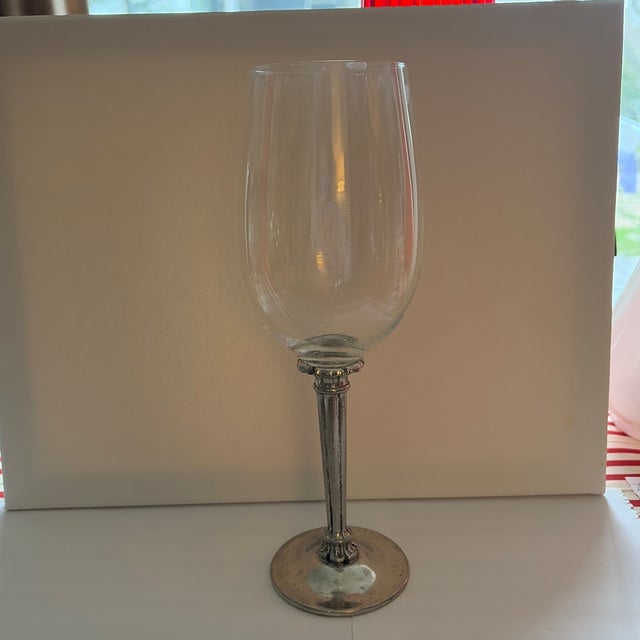 Williams Sonoma Italian Crystal Wine Glasses with Pewter 95 stem and base. A uniquely designed addition to a lovely table...
