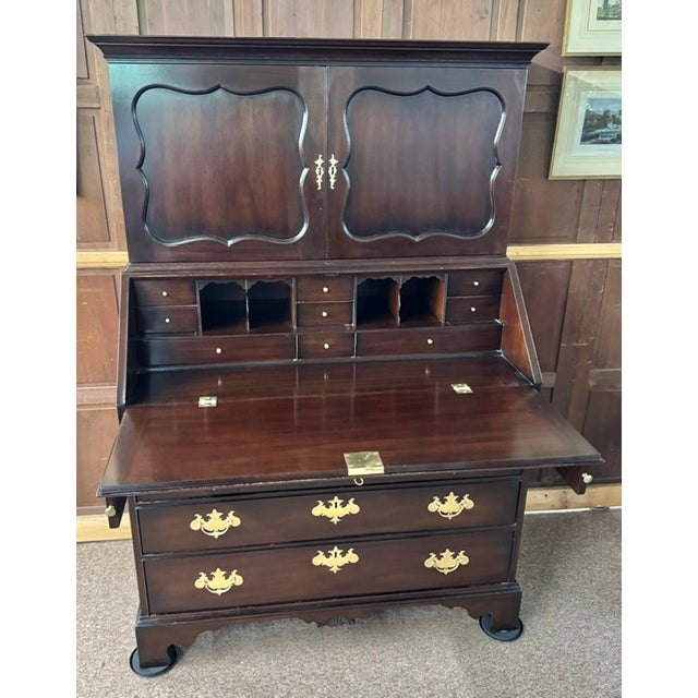 Kittinger reproduction for Colonial Williamsburg of a mahogany secretary desk in the museum's collection and shown in the...