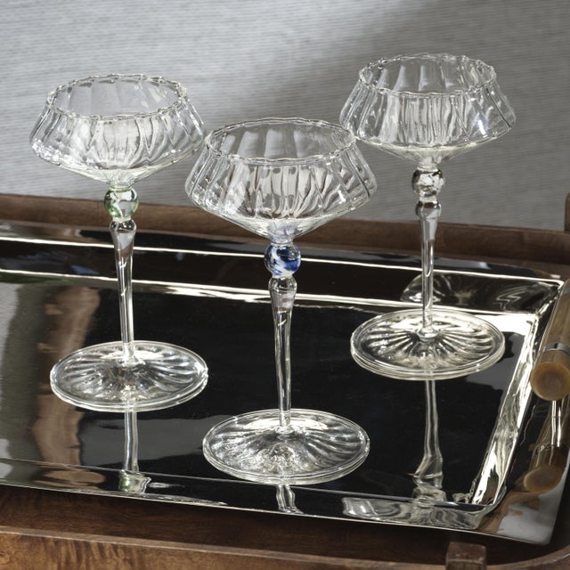 Elevate your glassware collection with the Ondine Fluted Coupe Glasses. Crafted from 100% borosilicate glass, these...