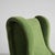 An early original 'Senior' lounge chair, upholstered in new green English velvet. Metal frame with brass leg fittings and...