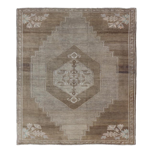 Turkish Vintage Kars Rug in Brown Background With Gray and Hints of Green For Sale