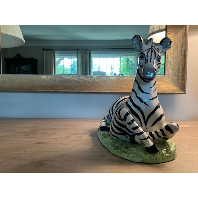 add this lovely large hand-painted Italian zebra figurine to your bookshelf for a splash of color.