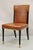 French Art Deco Style Brown Leather Ebonized Frame Dining Chairs - Set of 8. Chairs feature remarkable quality and...