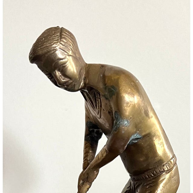Add a touch of classic sporting charm to your décor with this vintage solid brass golfer sculpture, featuring a...
