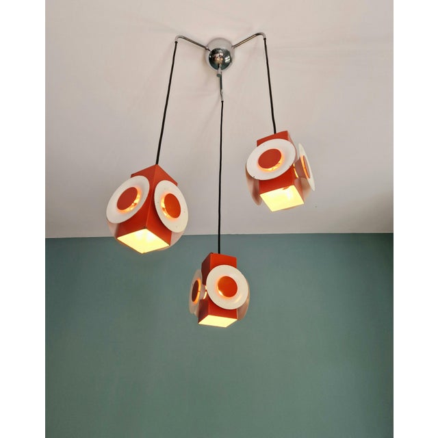 Space age waterfall chandelier from the 1970s, edition attributed to raak amsterdam. this chandelier features a chrome-...