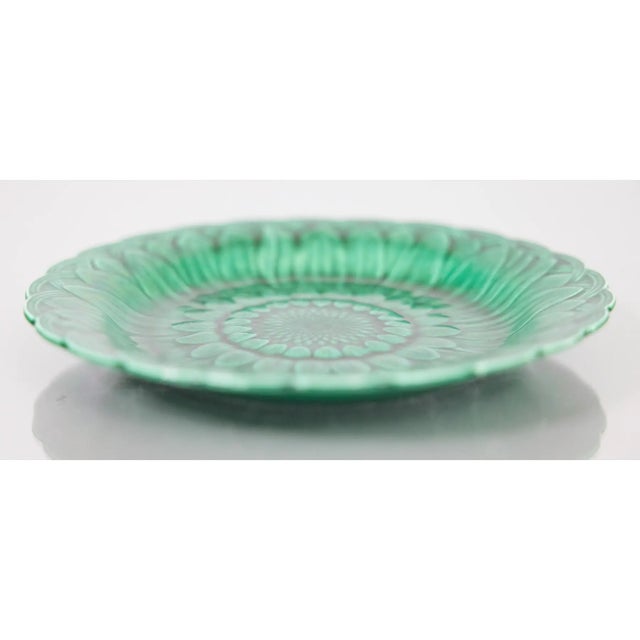 A lovely antique 19th Century English green glazed majolica leaf plate with a beautiful sunflower and basket weave design...