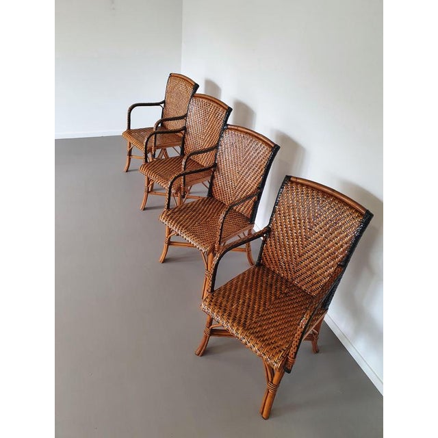 4 x rattan bamboo dinner chairs.