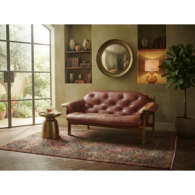 Bring a true piece of Eastern European modernist design into your home with this stunning vintage lounge sofa,...