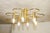 Designer ceiling lamp Designer ceiling lamp made around 1970. Six lights. Curved brass tubes and sockets. The lamp has...
