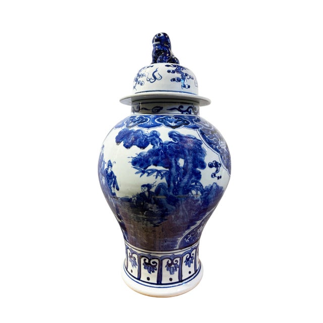 Superb hand-painted cobalt blue and white Chinoiserie porcelain temple jar featuring a detailed baluster form with hand-...