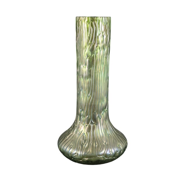 Circa 1900 Loetz textured green glass vase with an iridescent finish. There are a couple small chips on the top that are...