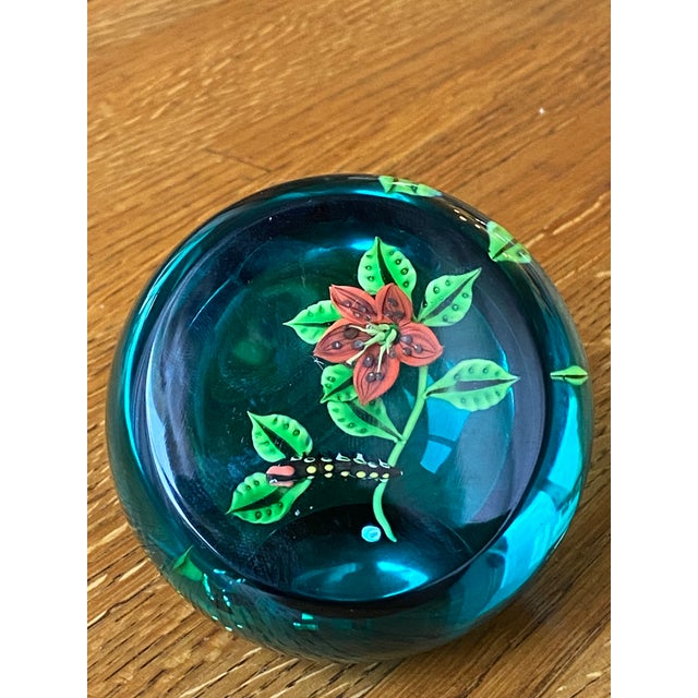 A Rare William Manson Lilium and Caterpillar Paperweight circa 1980s, marked "9-50", "Lilium" and "Caithness Scotland" to...