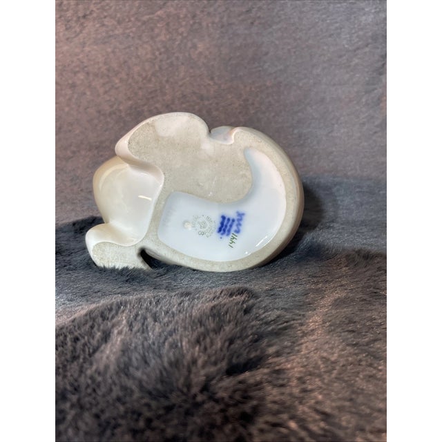 Beautiful vintage porcelain figurine by Royal Copenhagen of Denmark, renowned for their fine craftsmanship and timeless...