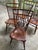 Classic set of four vintage Birdcage dining chairs by Nichols & Stone. Windsor style with faux bamboo accent spindle backs...