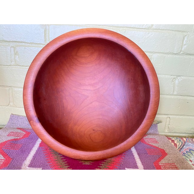 This is an absolutely beautiful solid cherry turned wooden bowl. It is by North Carolina Artist craftsman Rodger Jacobs,...