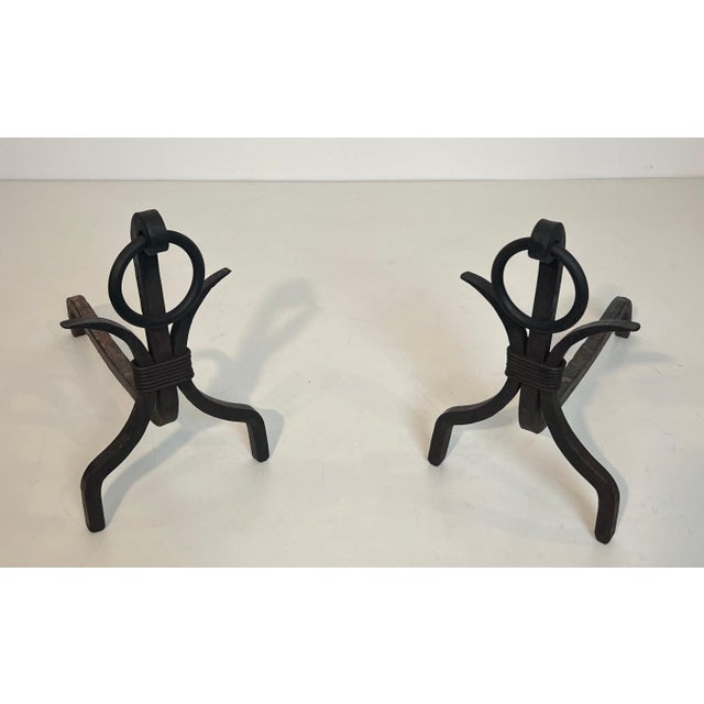 This beautiful pair of modernist andirons is made of wrought iron. It is a French work in the style of Jean Royère. Circa...