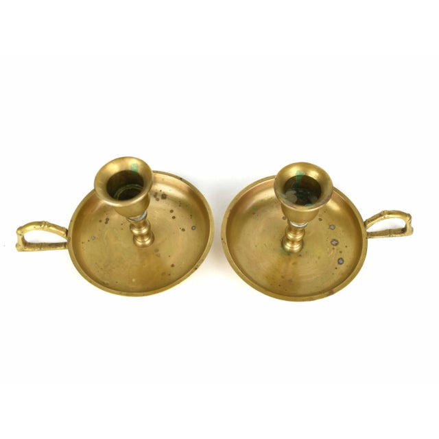 These candle holders are made from high-quality solid brass, ensuring durability and a luxurious look. The warm brass...