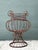 This vintage sculptural metal urn brings a strong architectural accent to a garden, entry, or interior setting. Crafted...