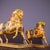This charming pair of horse figures—one large and one small—is crafted from a bronze body and richly decorated with...