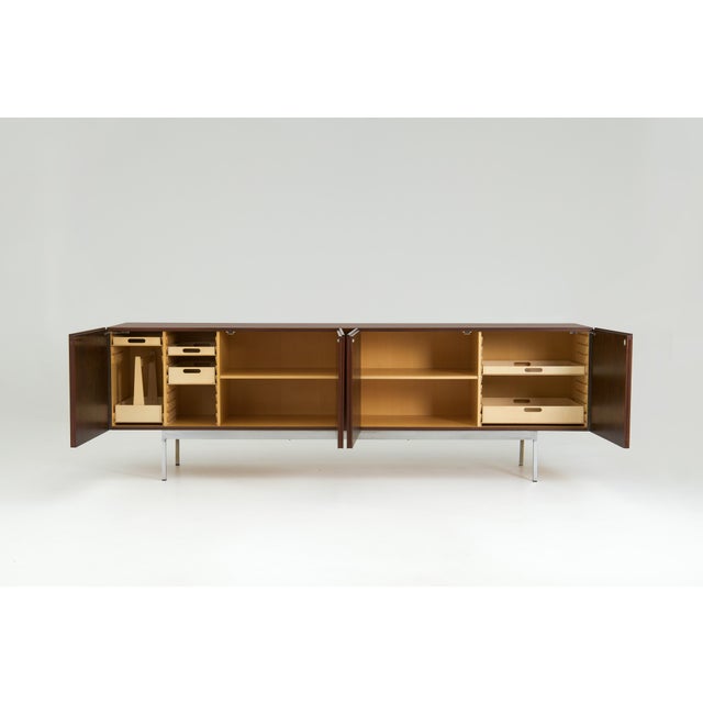 B-40 Sideboard in rosewood veneer with steel frame, designed by Dieter Waeckerlin in 1958 and produced by Behr, Germany. A...