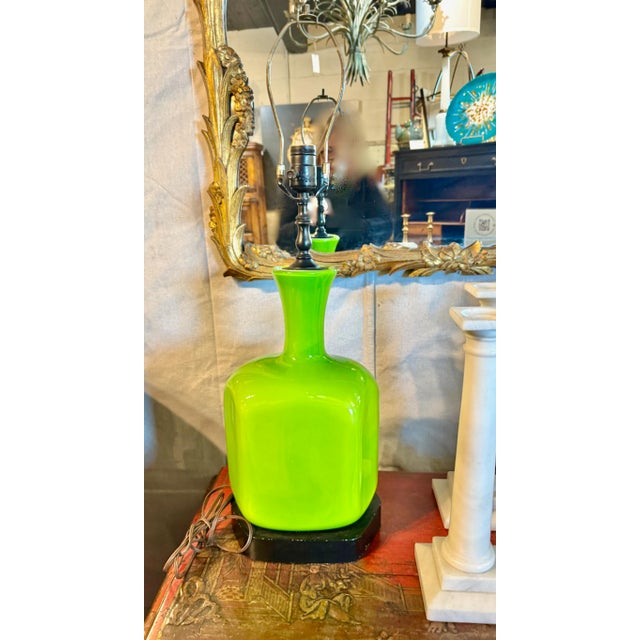 The life-filled green of this pair of lamps is breath-taking. The blown glass bodies appear to be cased opaline--whose...