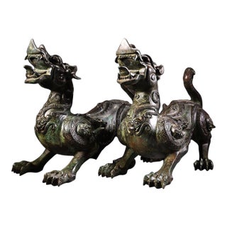 Late 20th Century Pair of Archaic Style Bronze Mythical Beast Figures For Sale
