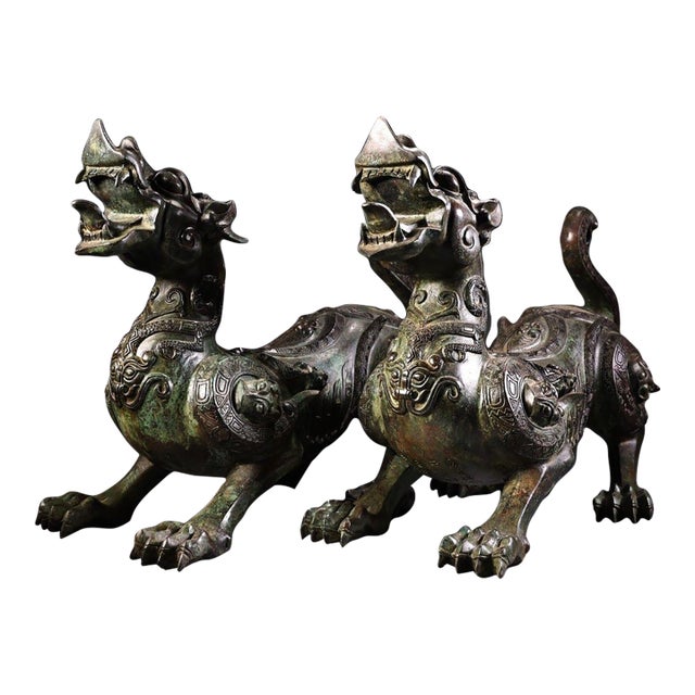 Late 20th Century Pair of Archaic Style Bronze Mythical Beast Figures For Sale
