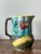 A fascinating and highly artistic example of late Victorian ceramics, this antique majolica pitcher is a masterpiece of...