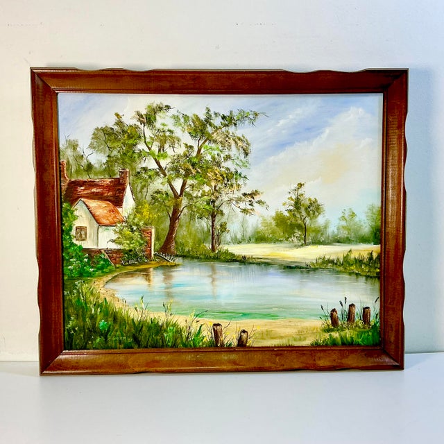 A lovely landscape country lake house original oil painting by American Donna Semm. The artist finished the work in 1983...
