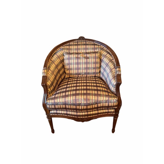 An exceptional Late 20th-century upholstered bergère chair from Henredon’s Schoonbeck Collection, featuring a gracefully...