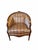 An exceptional Late 20th-century upholstered bergère chair from Henredon’s Schoonbeck Collection, featuring a gracefully...