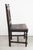 Neo-Renaissance Carved freestanding oak chair with vegetal motifs, circa 1900 Dark-stained oak Numerous carved motifs...