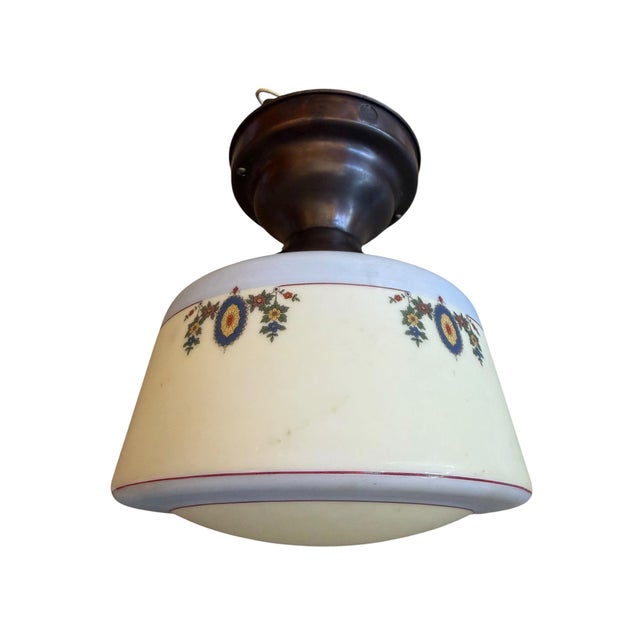 Handpainted and stenciled flowers adorn this ceiling light fixture. Perfect for any room of the house or a covered porch....