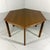 Beautiful extendable dining table. Hexagon shaped, probably oak, veneer table top and solid wooden legs. Suitable for 6 to...