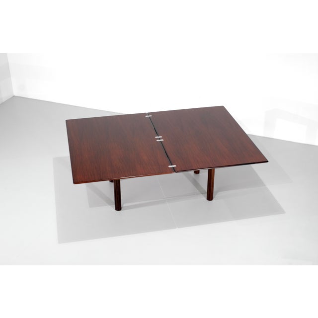 Extendable "Nibay" model wooden table with a folding and extendable base. To use the extension, simply rotate the tabletop...