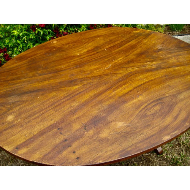 Beautiful and rare oval wine tasting table from Burgundy Louis Philippe style circa 1840. This piece is rare by 2 factors...