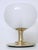 Magnificent lamp in the shape of a giant bowl. Italy, 1970s. The exquisite brass base supports an enormous opaque...