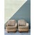 This stunning pair of vintage biomorphic lounge chairs is crafted from rattan, featuring a distinctive curvilinear form,...