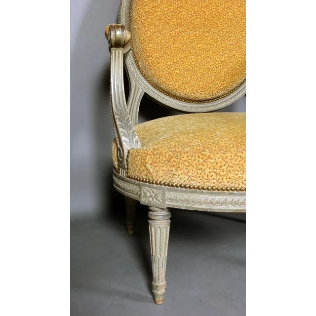 Pair of Louis XVI style armchairs, dating from the 19th century. These medallion file armchairs are made of painted wood...