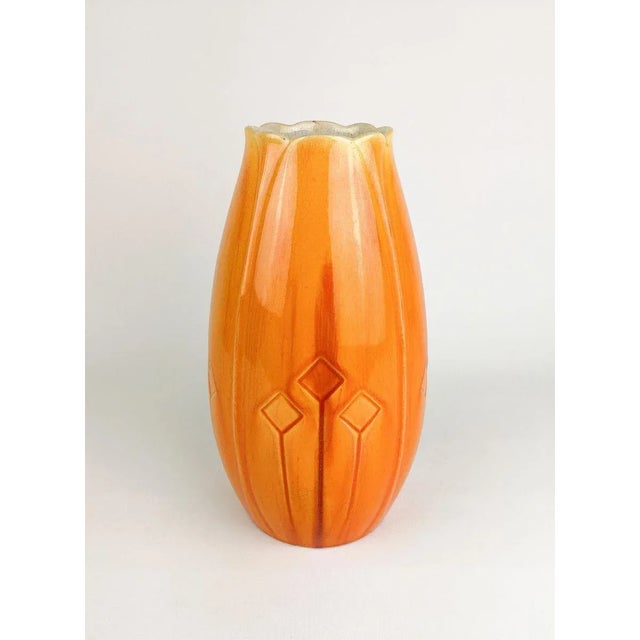 Nicely glazed Art Nouveau vase designed by Alf Wallander for Rörstrand Sweden. The glaze has a wonderful red/orange shine....