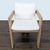 This Restoration Hardware chair features a sturdy weathered teak frame and comfortable white cushions. The simple, modern...