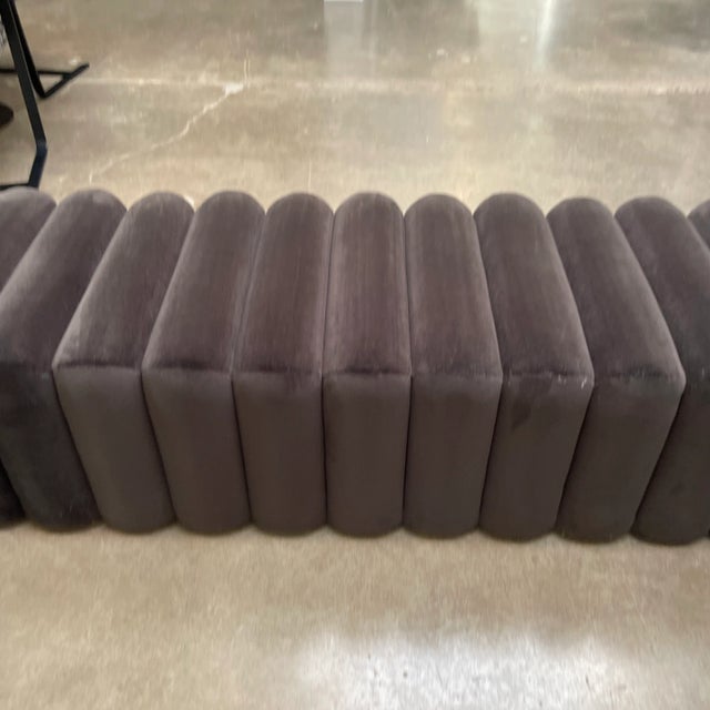 Custom fully upholstered ottoman in black velvet from S.Harris. Designed by Ben Johnston.