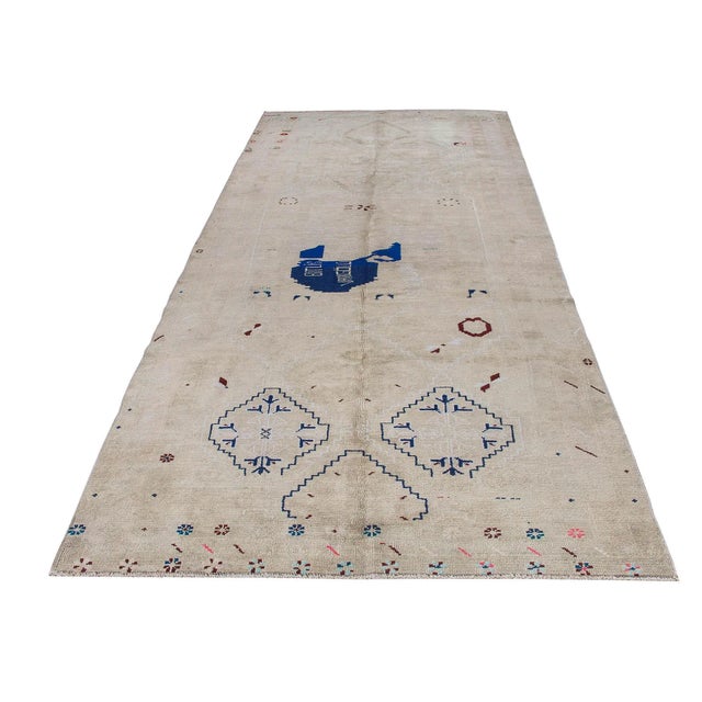 Vintage handknotted decorative wool rug from Kars region of Turkey. Approximately 50-60 years old. In very good condition.