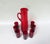 An elegant 8 -piece. Set consisting of a jug (water or juice jug) and 7 glasses in red from the 1950s, made by Reijmyre...