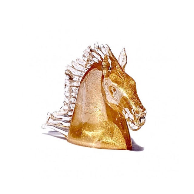 Horse head sculpture in Murano glass, expertly modeled with crystal and pure gold leaf. A unique furnishing accessory for...